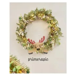 Artificial poinsettia wreath with glittered leaves in Alabama